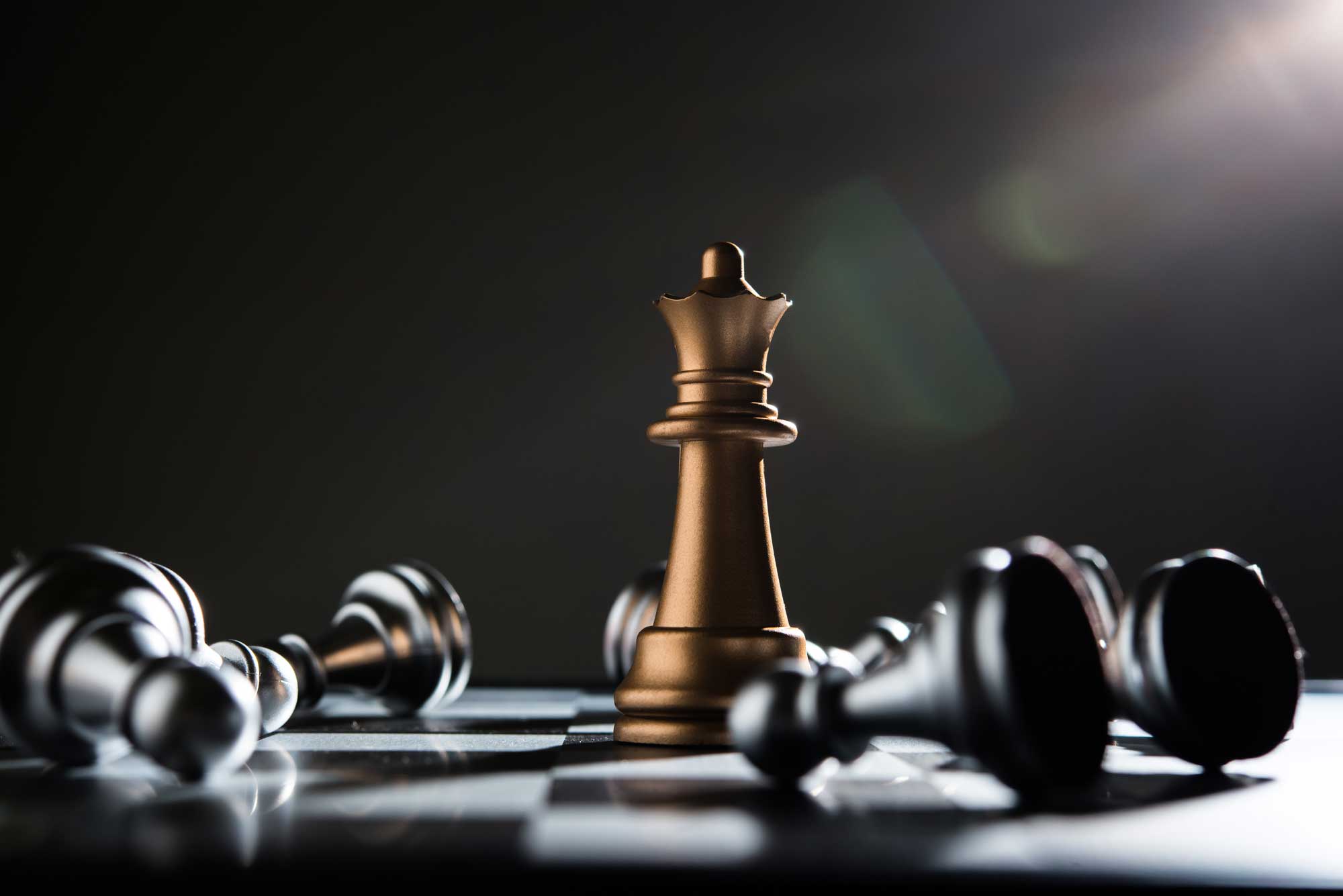 King and Knight of chess setup on dark background